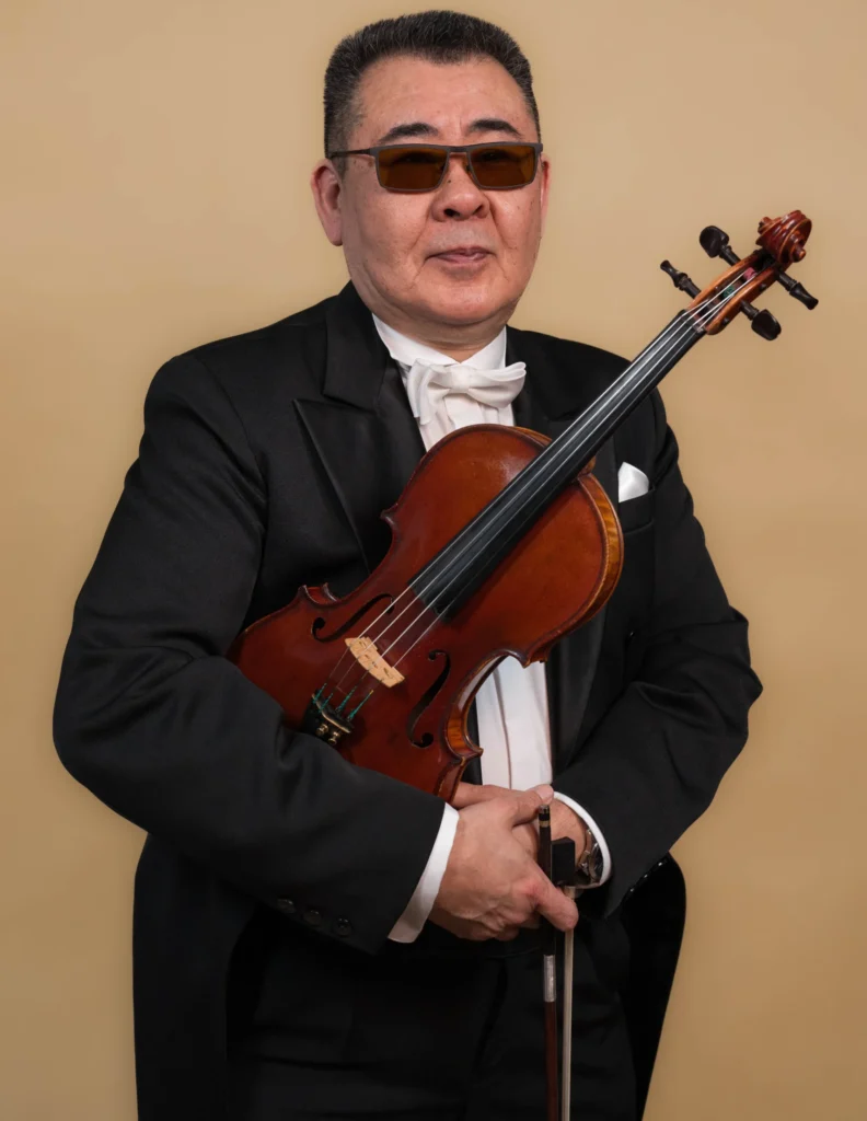 Zdjęcie członka orkiestry: Nurłan Alimbajew